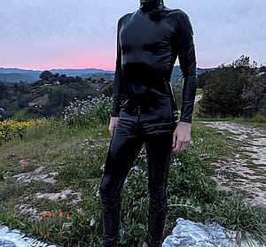 Sunset In A Latex Catsuit'