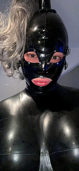 A Rubber Girl Living In Her Rubber World'