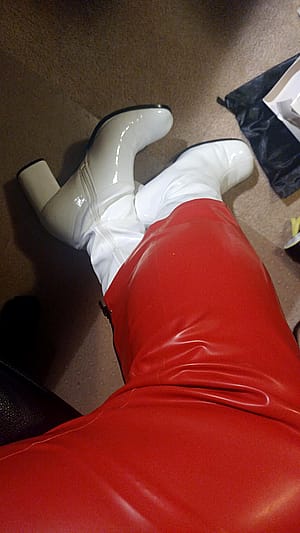 Red Latex Hobble Skirt And White Patent Boots.'